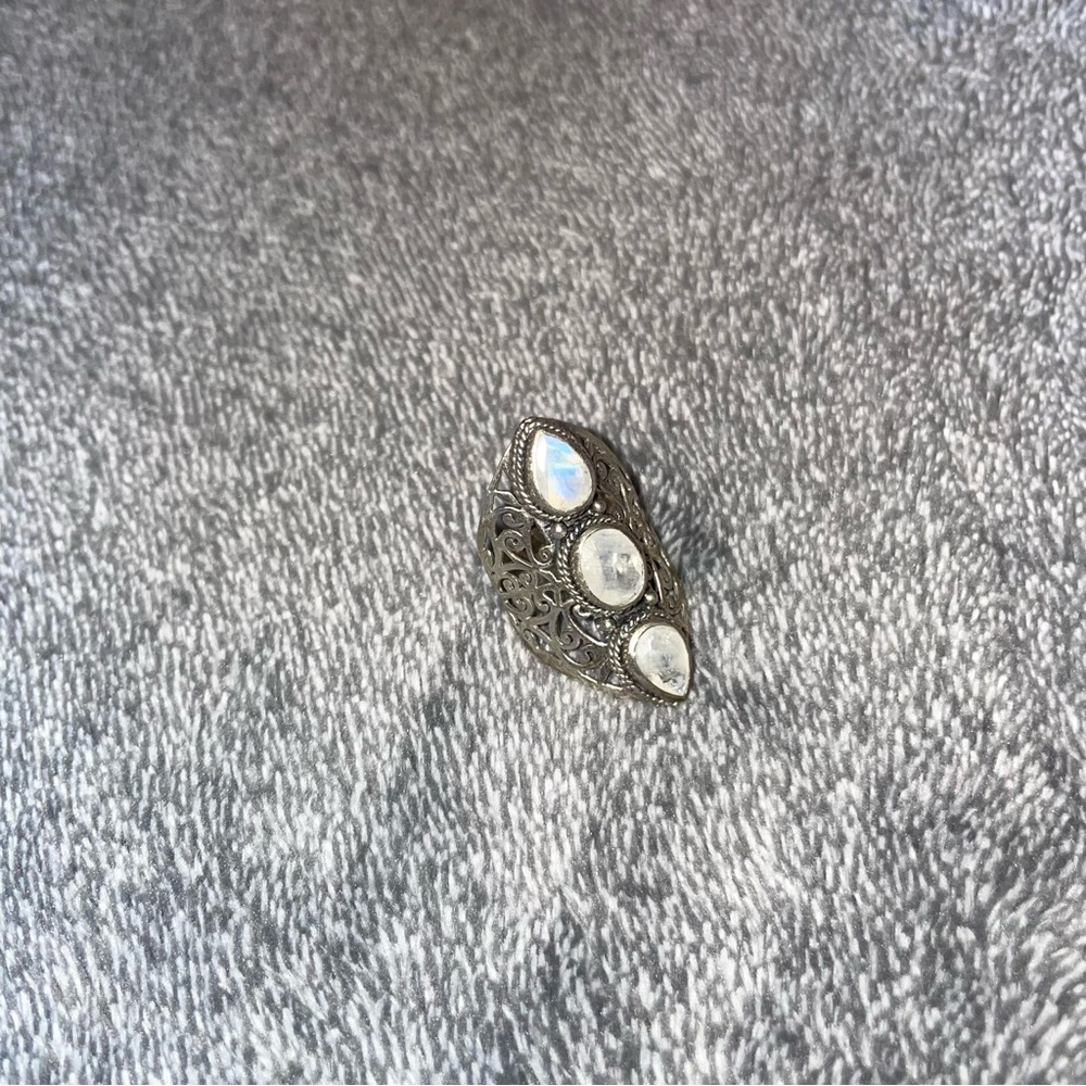 Elegant Silver Filigree Ring with Moonstone Accents